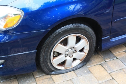 Flat tire that Sears Auto Center at Florida Mall mounted on customer car less than 36 hours previously